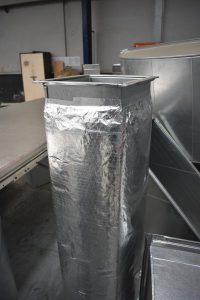 A square duct section including insulation to manage condensation challenges