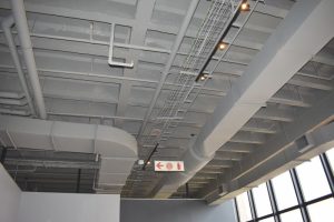 Painted steel ducting to meet client specifications in an office building.