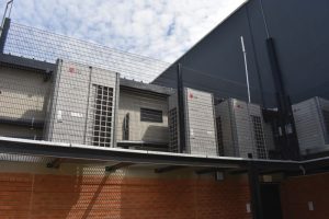 Elevated mentis grid HVAC plant area platform with multiple store dedicated LG VRF condensers.