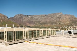 The rooftop Midea VRF system with Table Mountain as a backdrop.