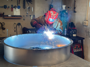 Manufacturing axial fan used for transformer cooling.