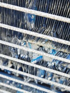 The general condition of the corroded condenser coils due to the corrosive environment were removed.